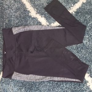 Exercise pants,  black with gray stripe down the side and sheer/lace calf detail